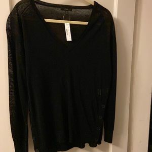 Brand new with tags. J. Crew sweater. 4 buttons down the side of the sweater.